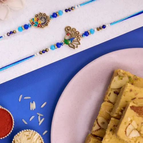 Graceful Peacock Rakhi Duo N Soan Papdi Delight